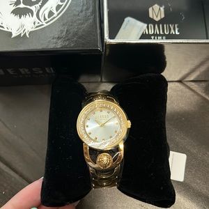 Versace versus gold watch with Swarovski